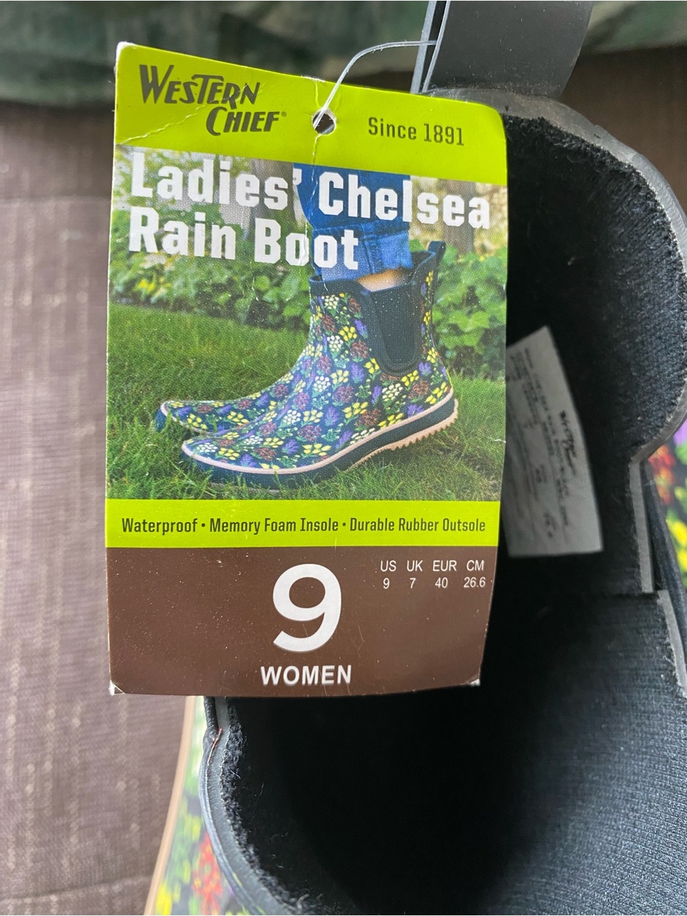 Western Chief Floral Chelsea Rain Boots in Black with Yellow, Purple & Green 9 - Picture 2 of 5